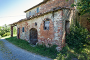Landgut Il Poggiale Toskana, altes Bauernhaus, Westseite  mit Zugang zum Weinkeller